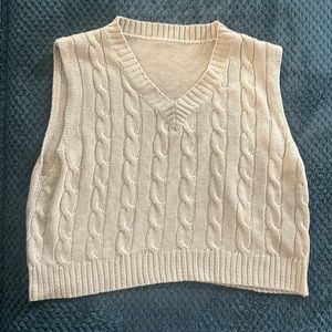 tan sweater vest